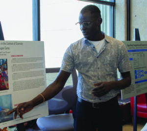 Student showing his research project during DARE